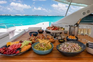 Fresh seafood, ceviche, guacamole and fruit prepared for lunch on a private Cancun yacht charter