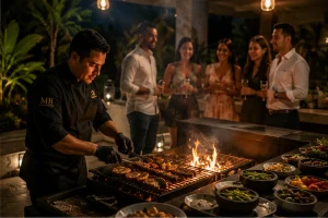 Private chef cooking over a live fire for a dinner party at a Cancun villa
