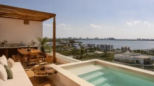 Riviera Maya Airbnb style condo with rooftop pool and lagoon views