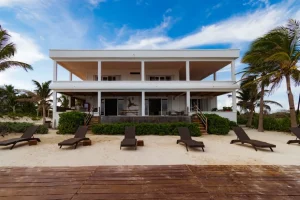 Riviera Maya Villa Catering at a private beachfront villa with outdoor terraces and direct Caribbean access