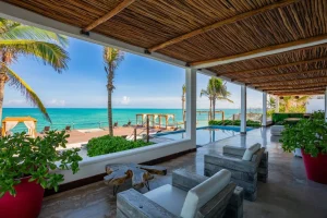 Riviera Maya Villa Catering setting with a private pool, covered terrace and Caribbean ocean views