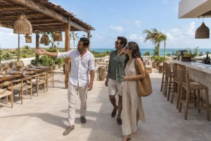 Friends planning a birthday celebration together at a tropical villa in Tulum