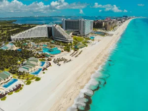 Cancun family vacation resort and Caribbean beach from above